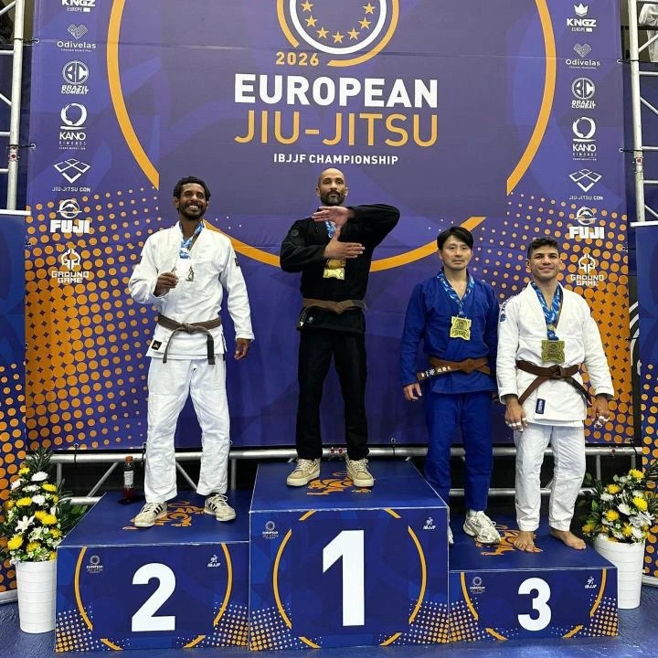 Coach Kami on Podium